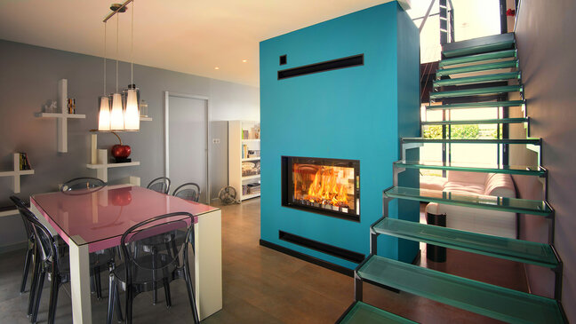 With doors that slide up into the wall Fondis are top of the range inset stoves